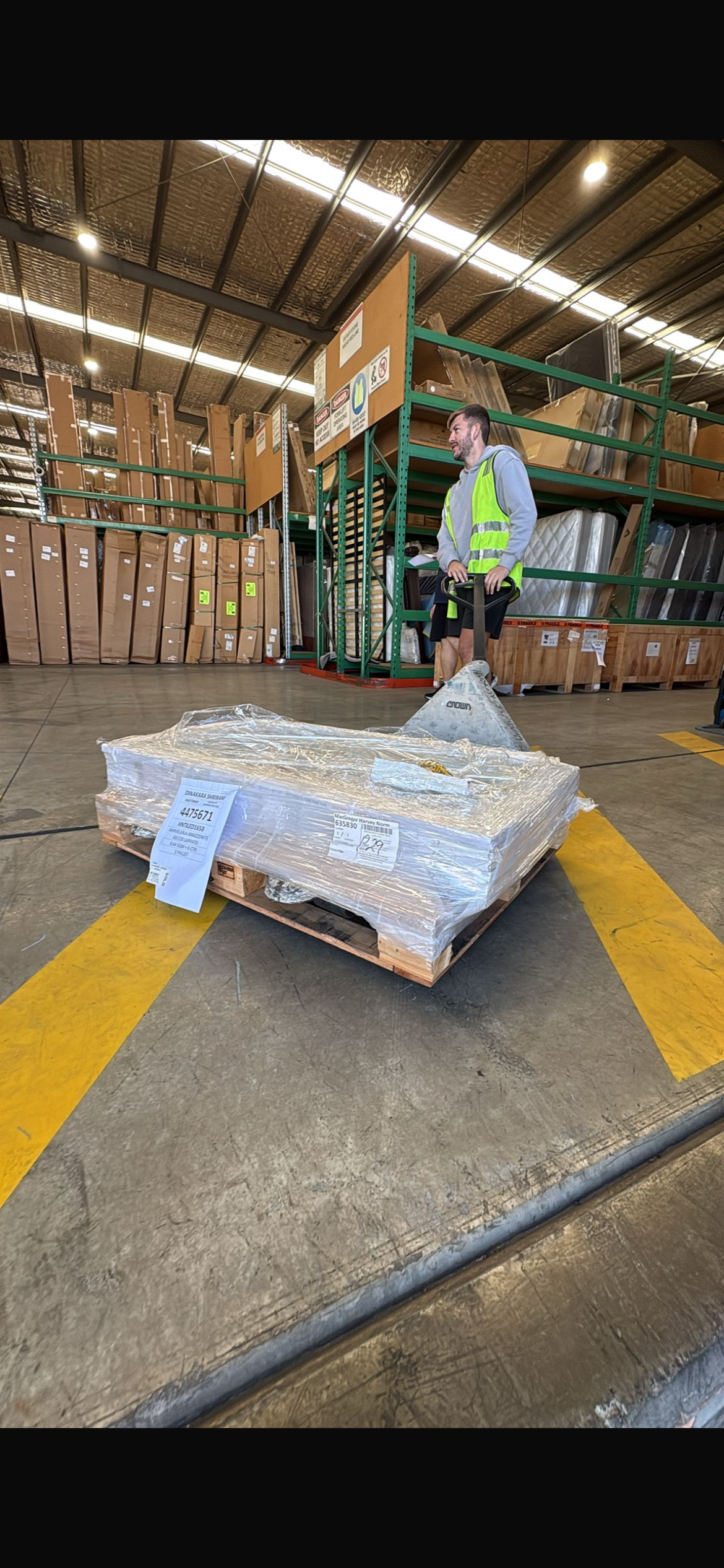 BMS team loading Harvey Norman freight for commercial delivery Brisbane